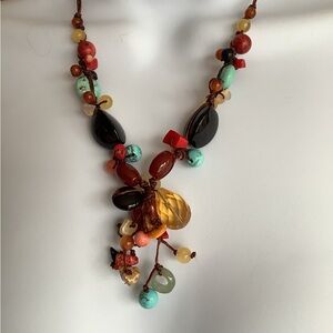 Multicolored stone necklace.